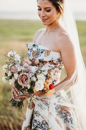 Bride in Patterned Wedding Dress Holding Rose Bouquet