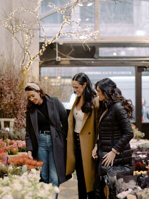 Bride and Bridesmaids Browse Flowers at Flower Market in NYC