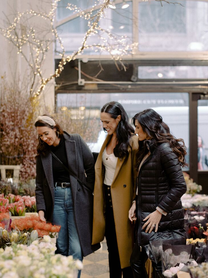 Bride and Bridesmaids Browse Flowers at Flower Market in NYC