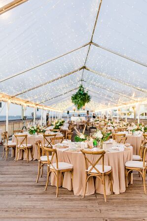 Beach Wedding Reception With Twinkle Lights and Clear Tent