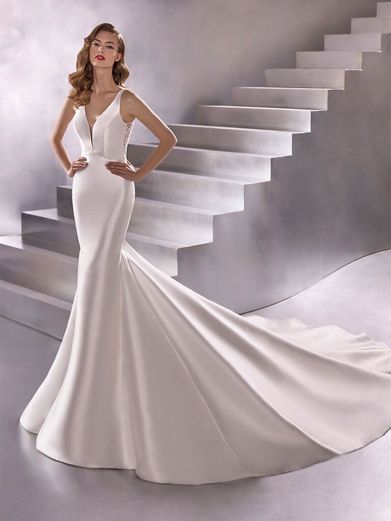 Atelier Provonias wedding dress mermaid gown with plunge neckline and lace back