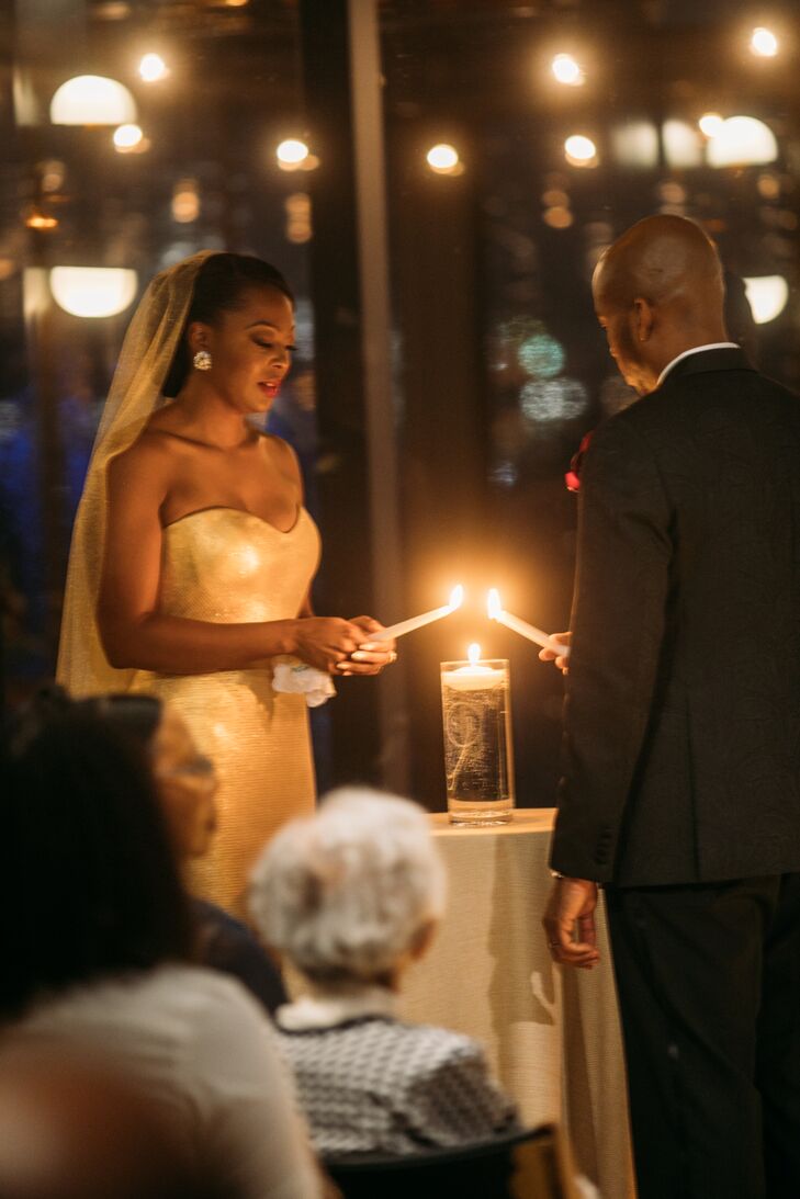 Romantic Couple Lighting Candle During Unity Ceremony