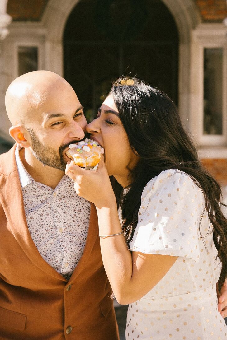 Couple Sharing Doughnut During Gibraltar Elopement