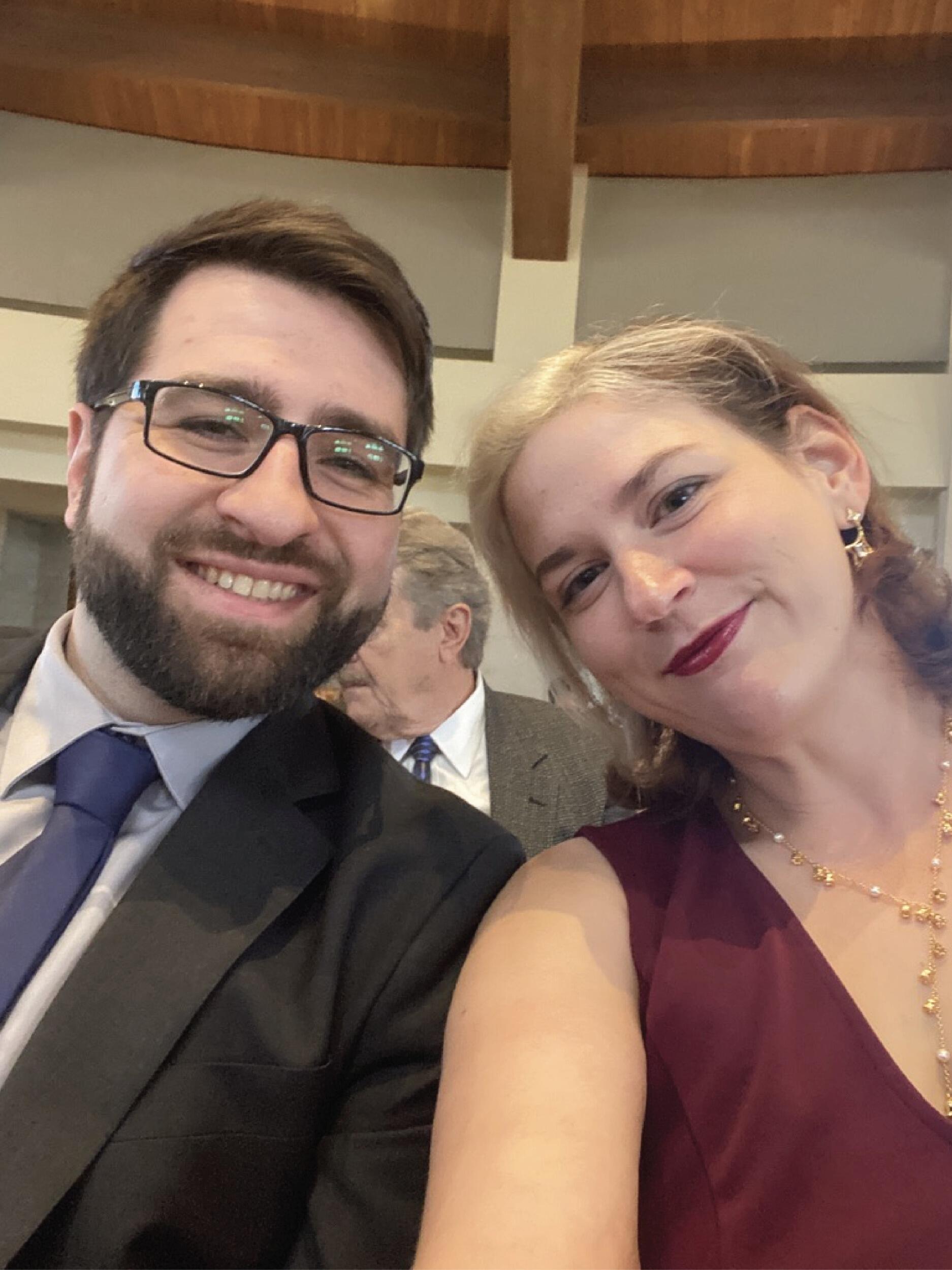 Charlie wore his suit for the first time and they got dressed up for a friend's wedding.