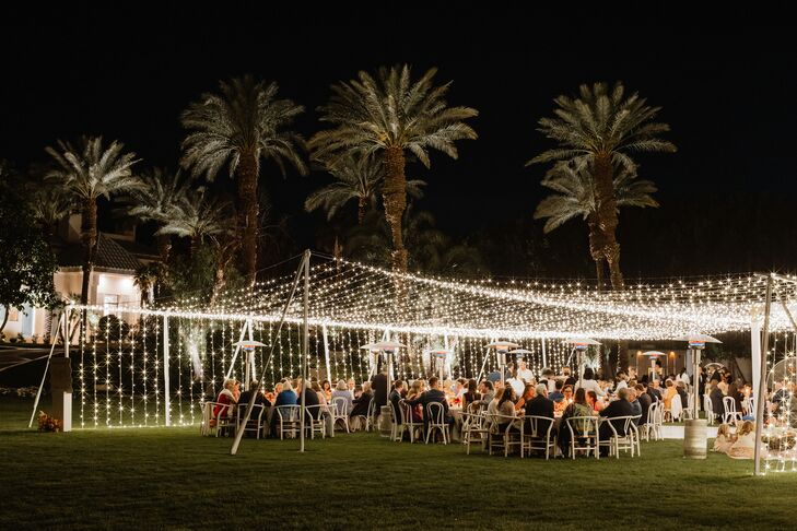 Palm Desert Wedding at Night Under String Light Structure on Lawn