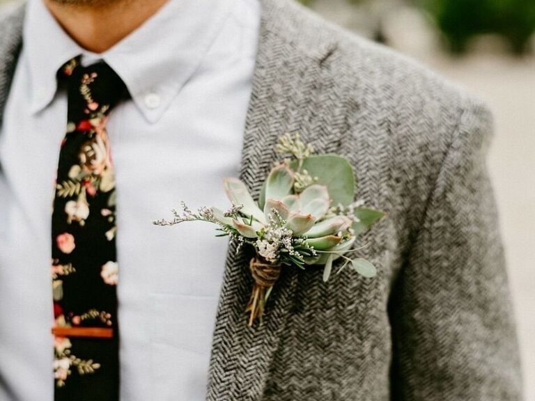 Groom with wool suit jacket and succulent boutonniere