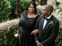 Groom and mother of the groom having a private moment before the ceremony.