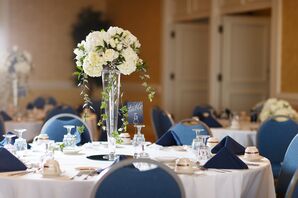 White Floral Centerpieces and Navy Linens