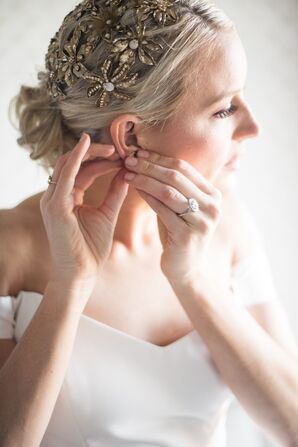 Bride with Low Bun and Gold Flower Hair Pins