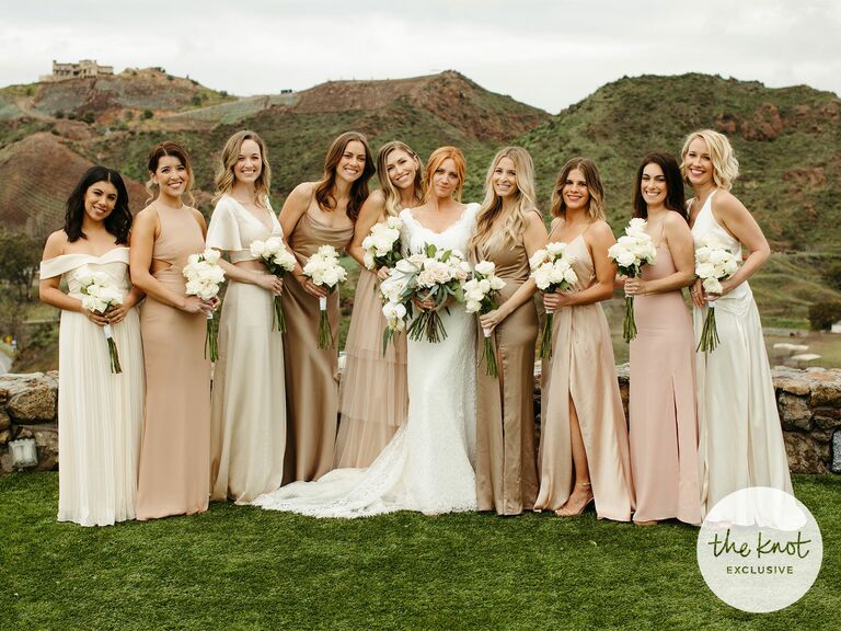 Anna Camp smiles with the wedding party at Brittany Snow's wedding. 