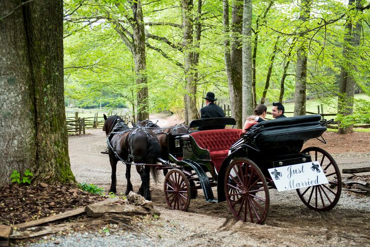 Ashley and Miguel exited their outdoor ceremony at the Neverland Farms in a romantic horse and carriage ride with a white sign attached to the back of the carriage that read, "Just Married" with surrounding pictures of wedding bells.