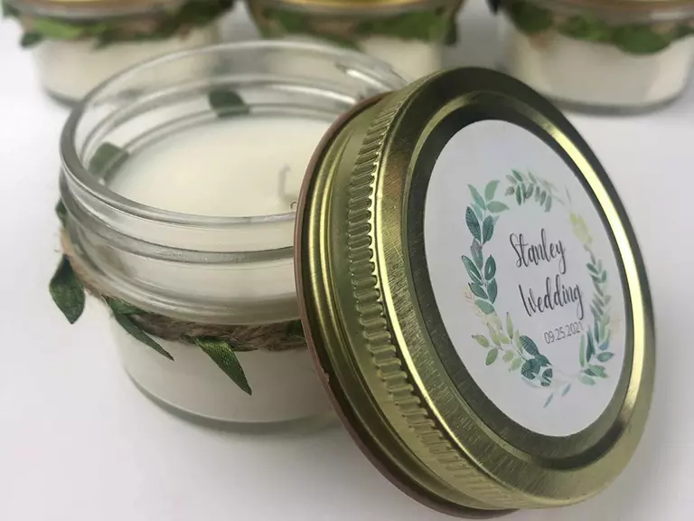 Personalized scented candles in glass mason jars. 