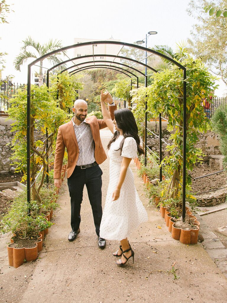 Dancing bohemian engagement photo idea. 