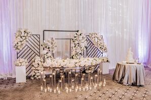 Wedding Sweetheart Table With White Roses and Candles