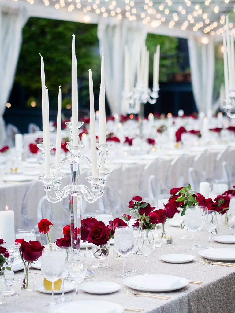 Red rose and candelabra centerpieces for your romantic Disney-themed wedding