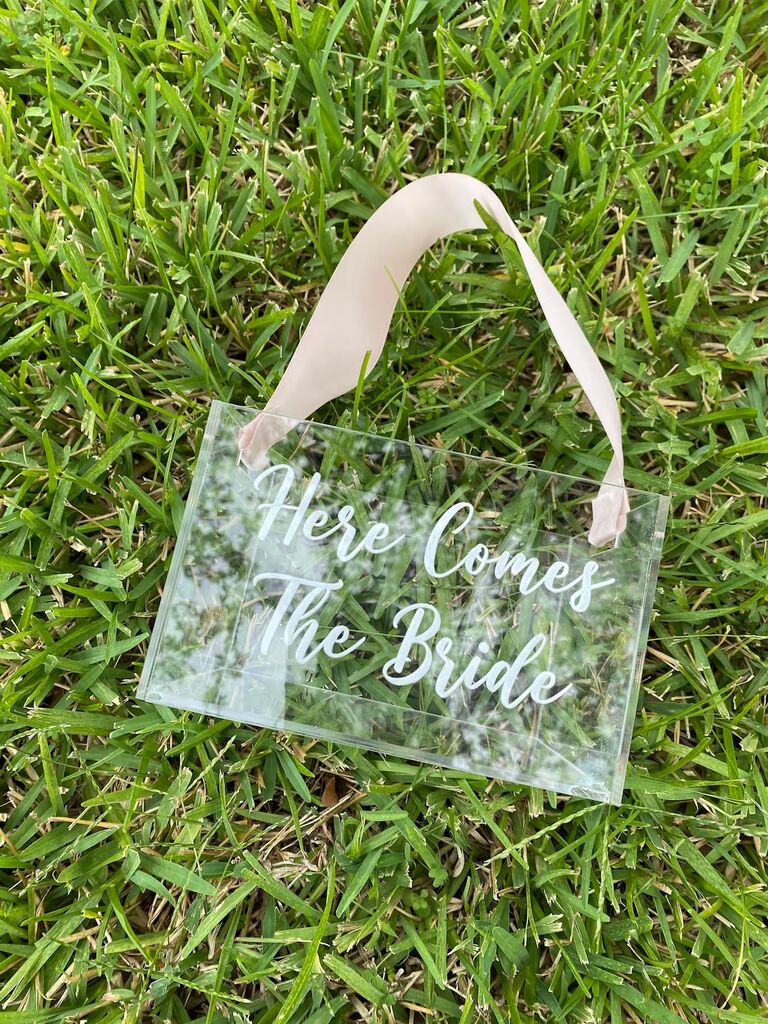 Cute see-through bag that says Here Comes the Bride from LKBCustomDesigns
