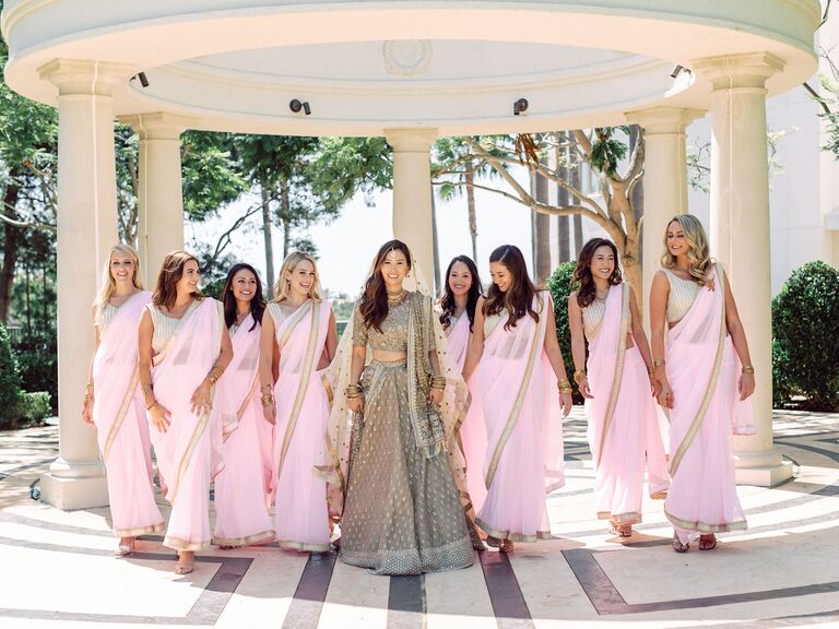 Bridesmaids in sheer soft pink wedding saris. 