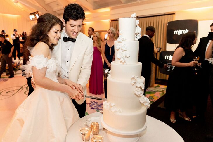 Elegant Tiered Fondant Wedding Cake with Flowers