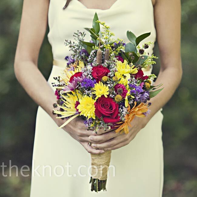 Jen is talented and owns her own event design company and her team helped with a lot of the wedding details. The morning of the wedding, Jen’s sister-in-law arranged the bouquets with a mix of flowers picked from a country road and bought at a grocery store.