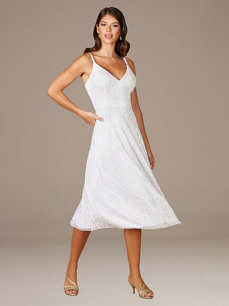 david's bridal white tea length wedding dress with v-neckline spaghetti straps allover beading and flowy skirt