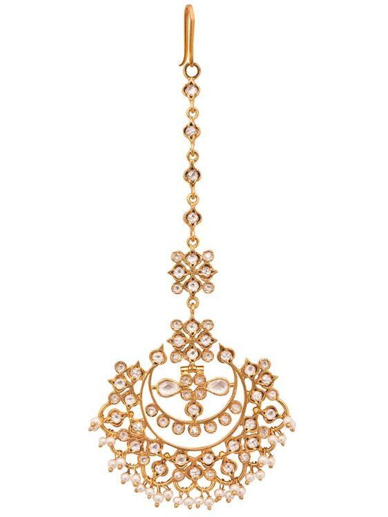 Beautiful gold jewelry piece with crystals. 