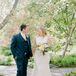 Classic Couple with Formfitting Wedding Dress and Blue Suit