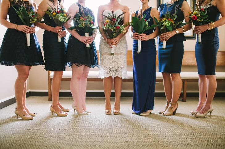 Megan wore a strapless knee-length lace wedding dress because she wanted her look to be simple and casual for her and Ray’s bohemian wedding.