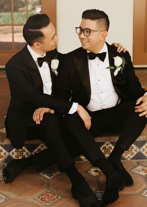 Grooms in Classic Black-and-White Tuxedos With Matching White Boutonnieres