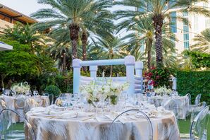 Lawn Reception With Round Tables, Textured White-and-Rose Gold Linens, White Bouce House