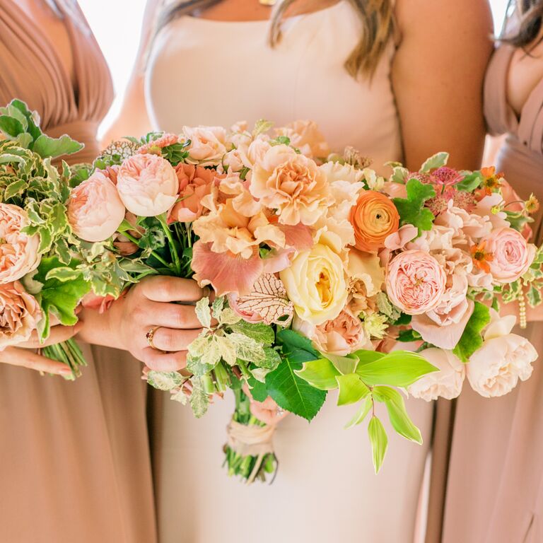 Coral and apricot toned wedding bouquet