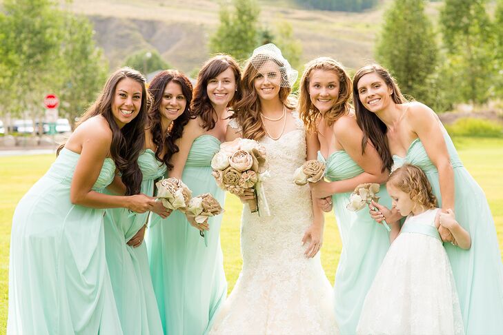 When it came to choosing the bridesmaids’ dresses, making sure they were cool and comfortable was key. Melissa chose a strapless, floor-length gown from David’s Bridal for all of them to wear, the flowy chiffon fabric making it easy for them to move around, while standing up to the summer heat.