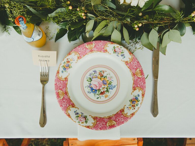 Beautiful china plates at a small wedding reception. 