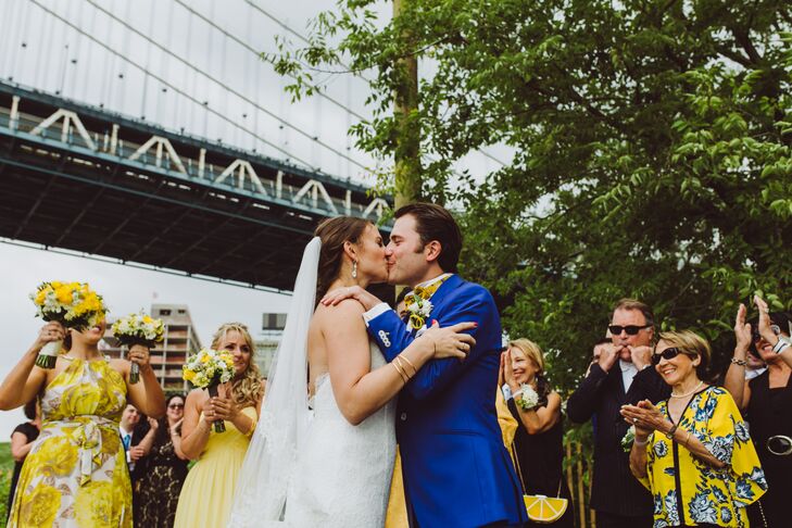 The couple gathered their family and friends at Pebble Beach in Brooklyn Bridge Park for an intimate ceremony with direct views of the Manhattan skyline. “Having a wedding in a public park was challenging, but we pulled it off,” Candice says. “No flowers were necessary, which was a huge budget saver.’’