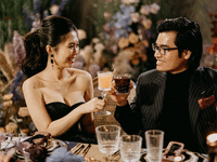 Bride and groom toasting with their signature cocktail.