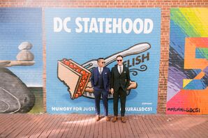 Couple Posing in Front of Mural in Washington, DC