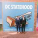 Couple Posing in Front of Mural in Washington, DC