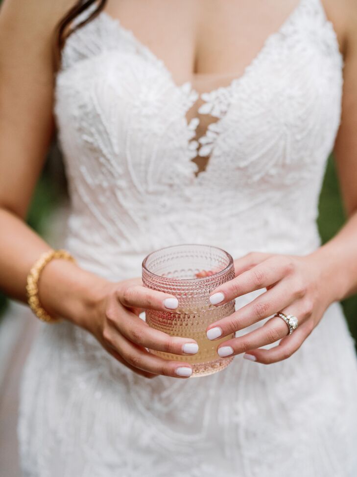 Bride Holding an Orante Drinking Glass With Oaxaca Old Fashioned Cocktail