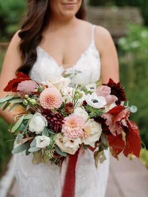 Bride Holding Fall-Inspired Bouquet With Red Leaves, Pink and White Flowers