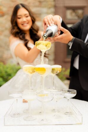 Bride and Groom With Champagne Tower