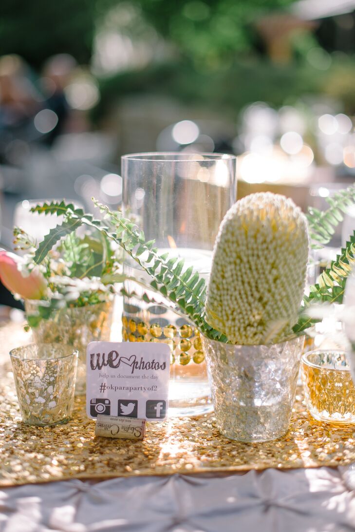 The couple created a hashtag (#okparapartyof2) and displayed it in a We Love Photos sign on the reception tables.
