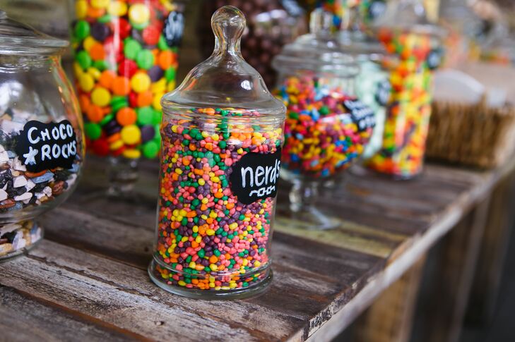 Mindy’s mother put together a knockout candy bar for guests to nibble on all night, filling glass apothecary jars with some of the couple’s favorite sweet treats. “Marcus is a big candy lover, so this was a must-have,” Mindy says. “We had a bunch of leftover candy and took a lot on our 10-day honeymoon to Alaska.”
