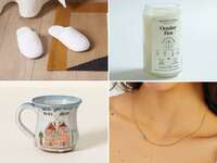 Four sister-in-law gifts: slippers, birthdate candle, initial necklace, and ceramic mug