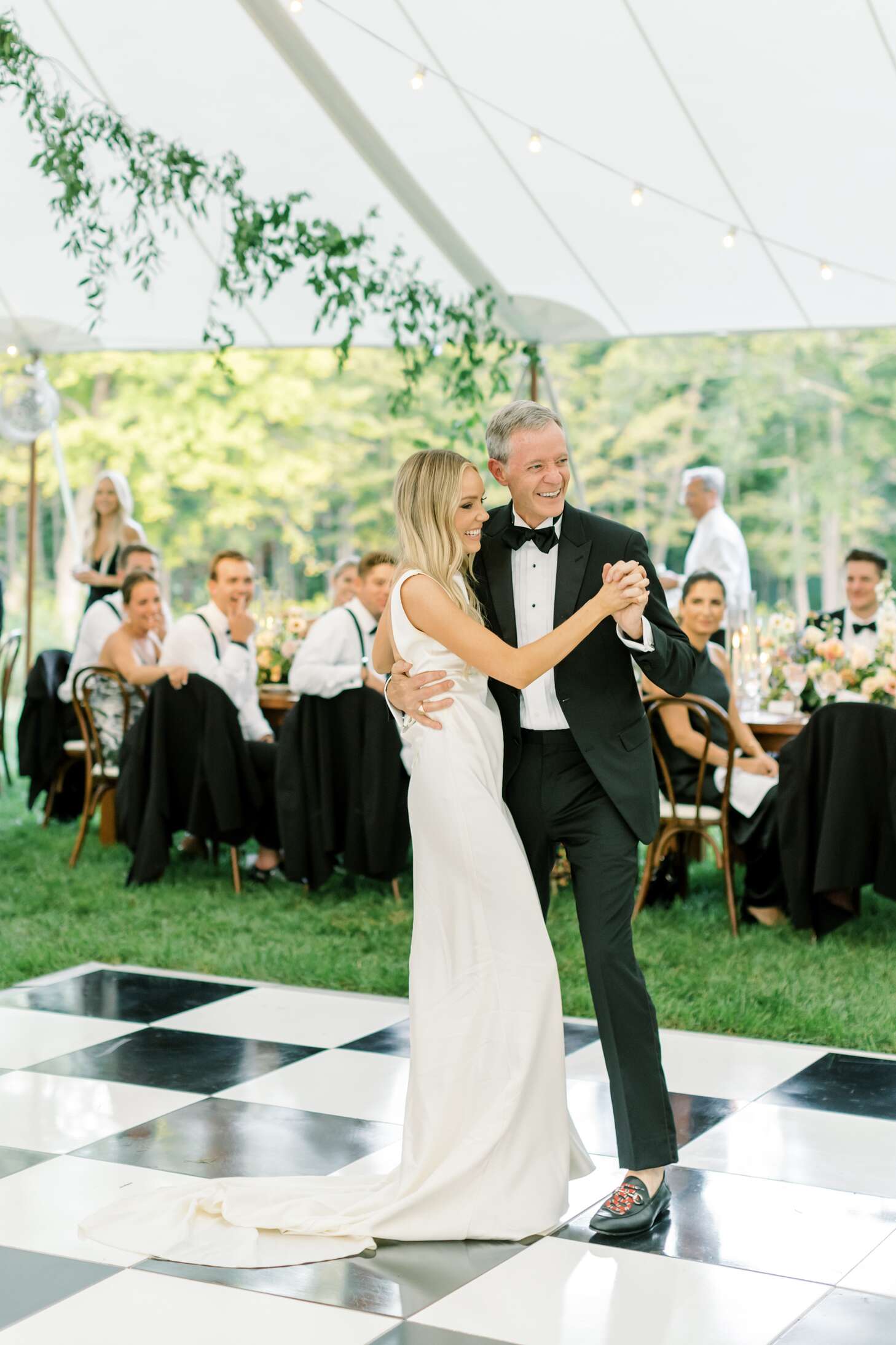 Bride in Sleek Silk Gown Doing the Father-Daughter Dance With Dad in  Classic Tuxedo, Checkered Dance Floor, Tented