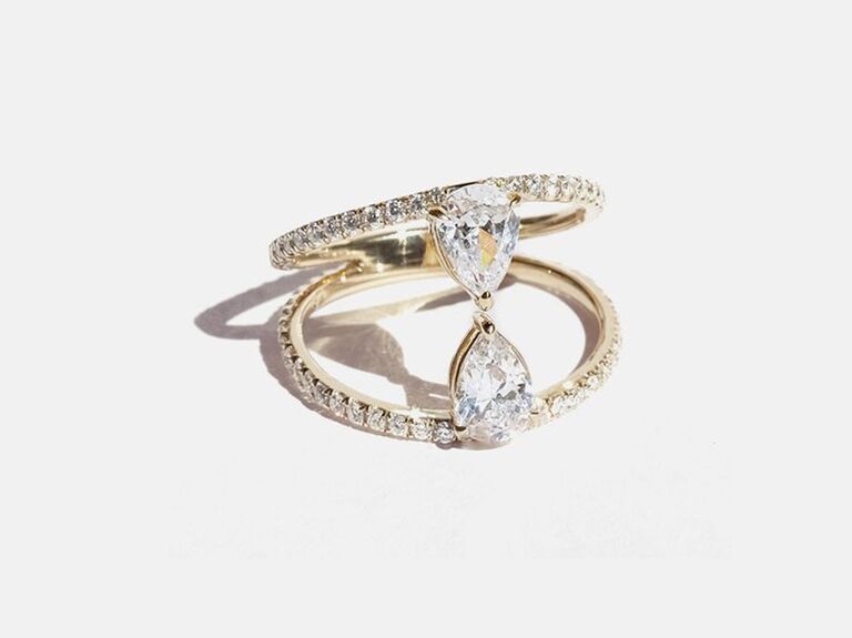 pear shaped diamond two stone ring in open pave setting