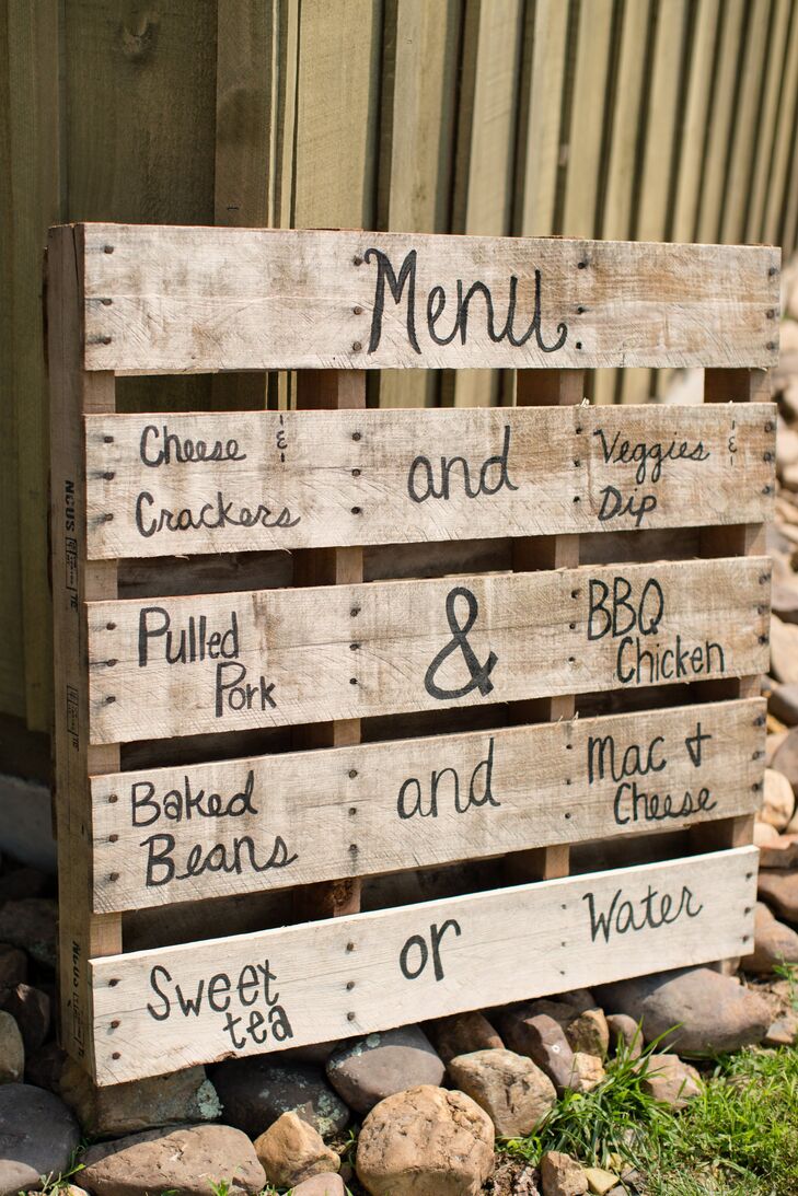 The menu was painted on a rustic wooden pallet.