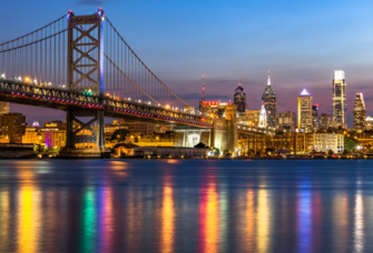 Philadelphia skyline and benjamin franklin bridge at night