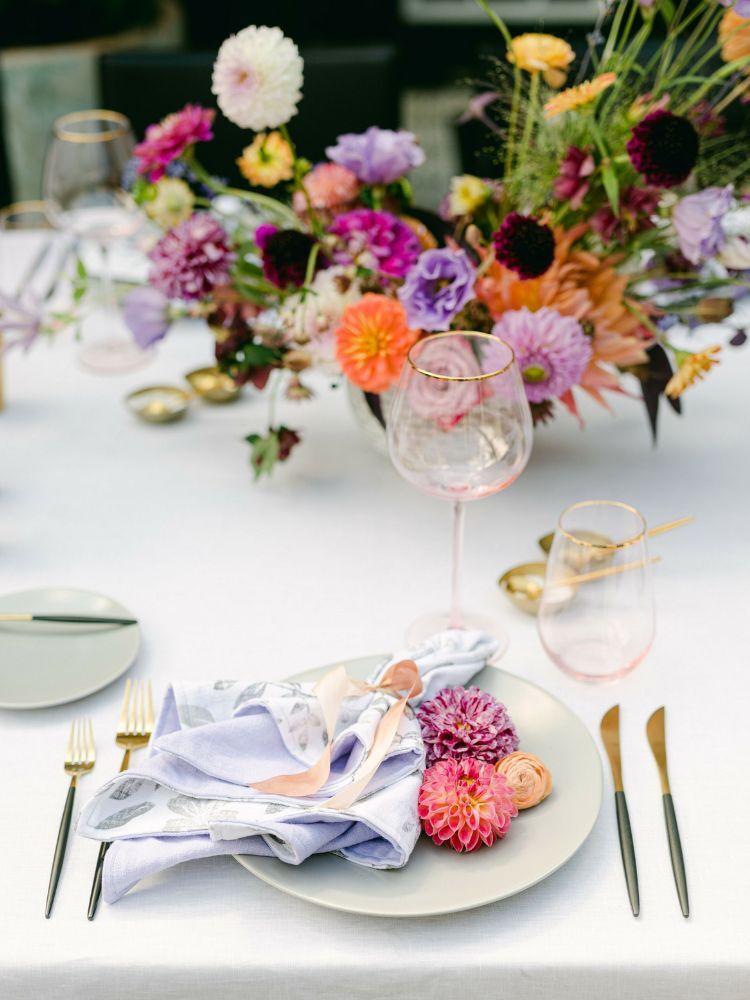 place setting with fresh dahlias