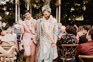 Grooms During Recessional at Glamorous Backyard Wedding Ceremony