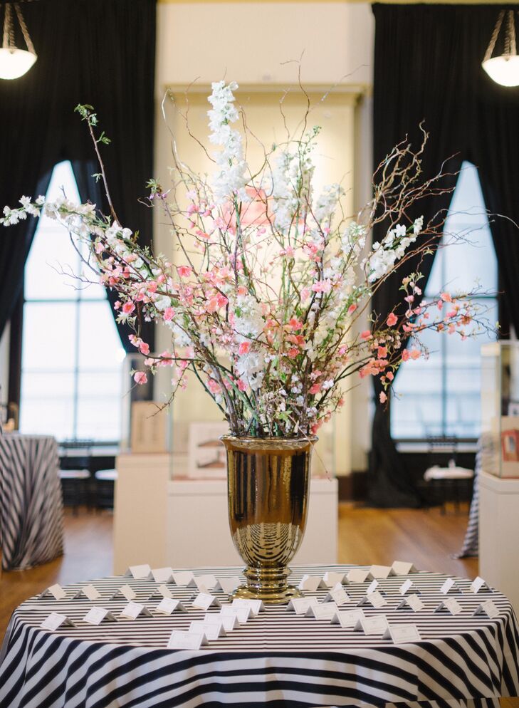 Black-and-White Striped Escort Card Table with Cherry Blossoms Arrangement