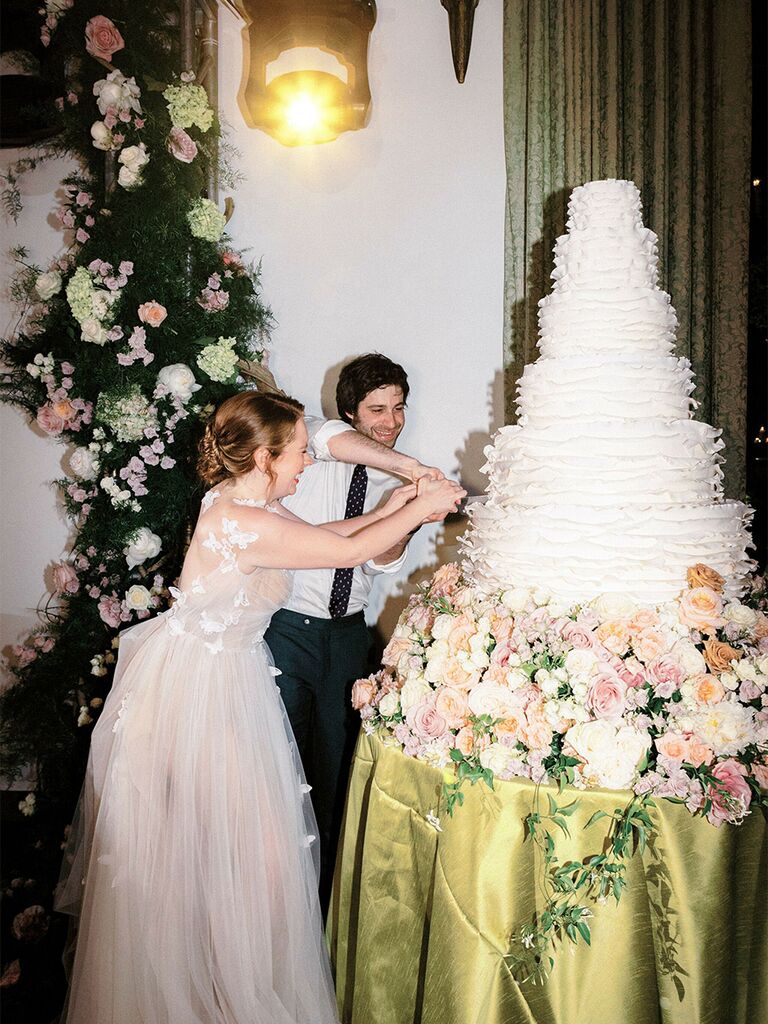 Six-tier fairytale-themed wedding cake